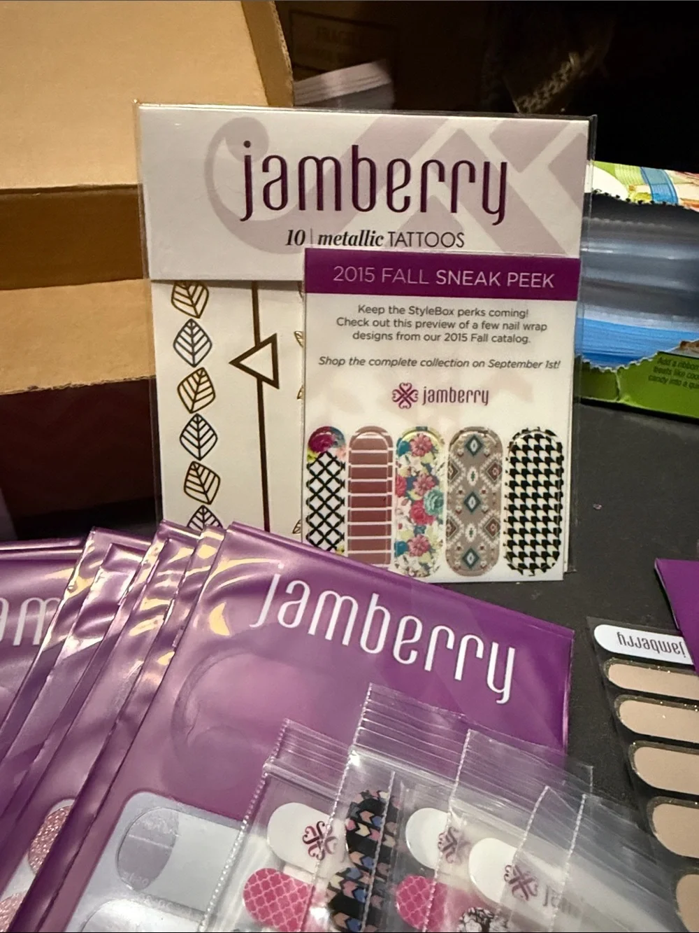 Jamberry Nail Wraps Assorted Styles in Purple Packaging